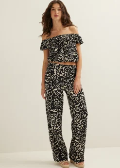 Outlet Cotton Club Off-shoulder top met tweekleurige print zwart